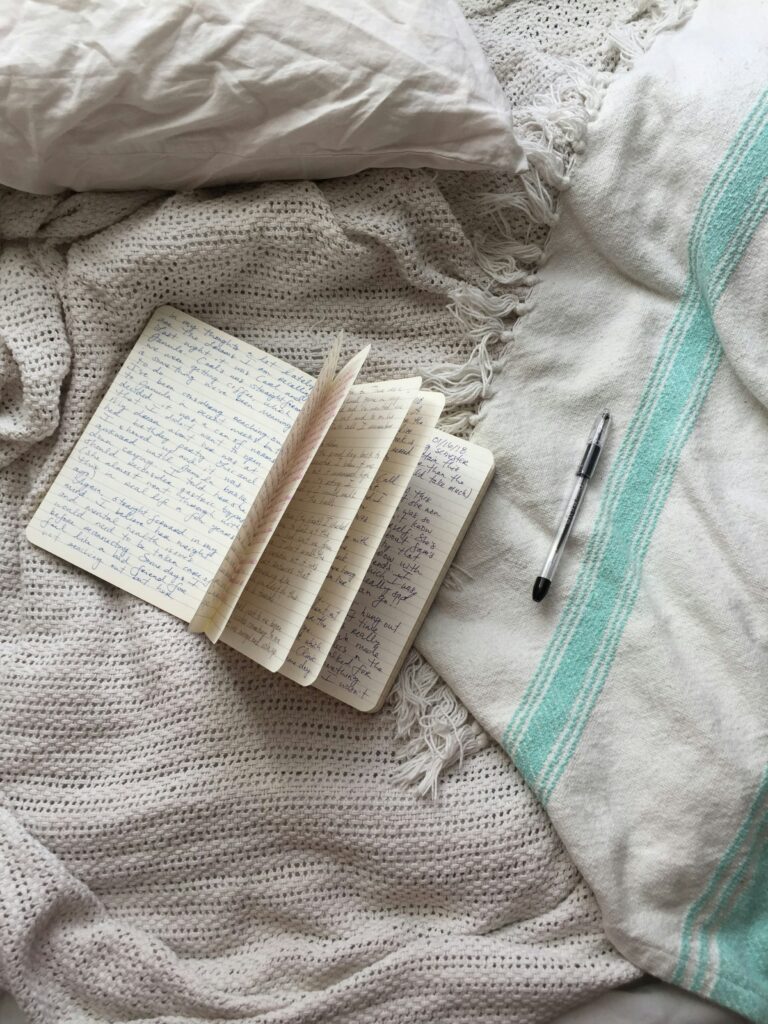 meg-jenson-igDsE9MaNNA-unsplash A written word in my journal to symbolize a word to my readers
