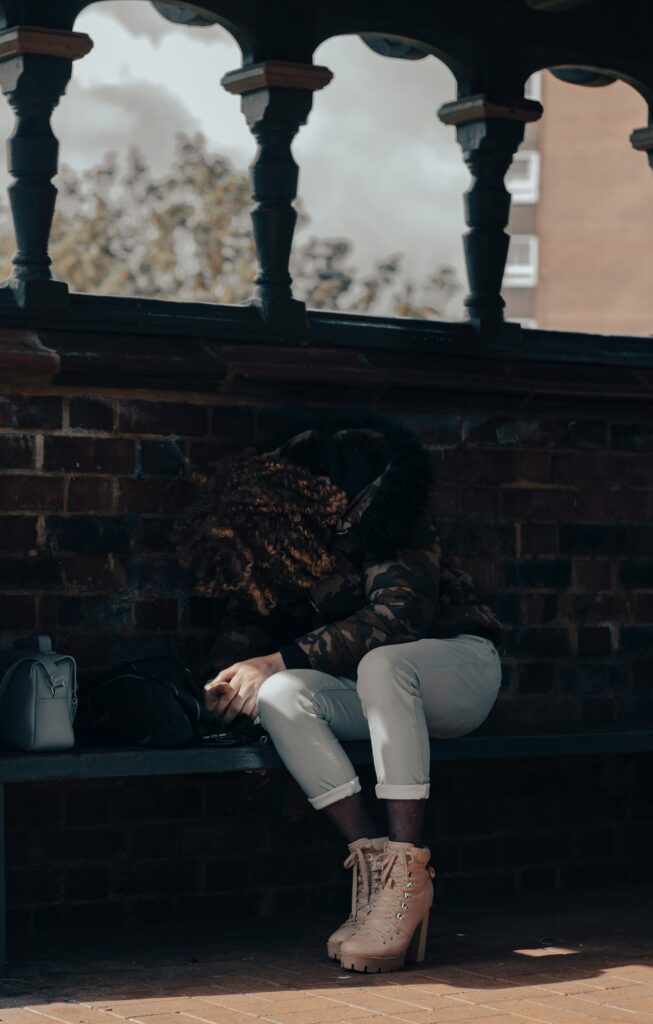 tolu-akinyemi-GqhIjqku7nw-unsplash Woman on a bench hurting emotionally. Healing is imminent.